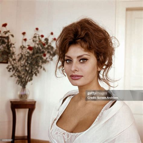 Sophia Loren sultry glamour portrait in low cut white dress circa ...