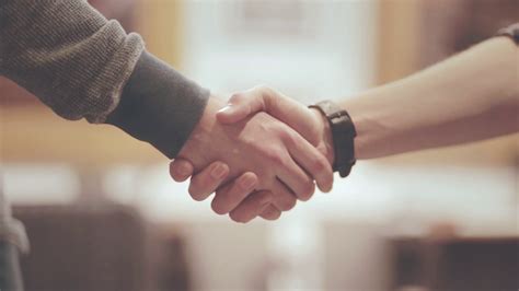 Two Friends Shaking Hands