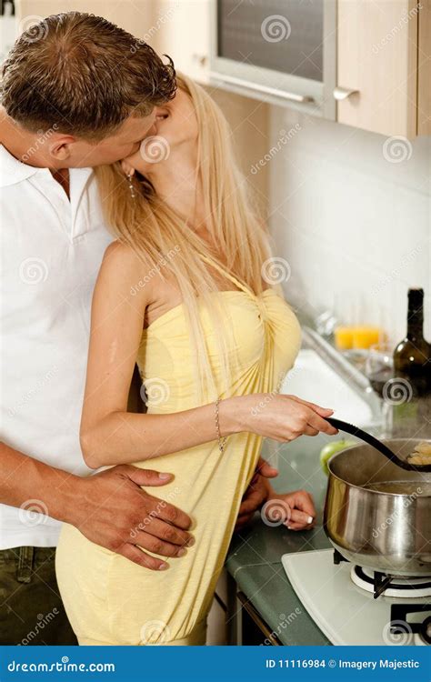Love in the kitchen stock photo. Image of home, seductive - 11116984