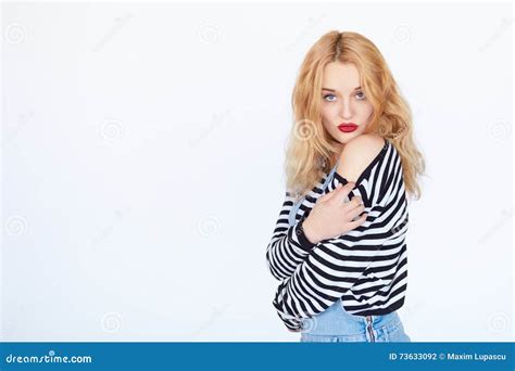 Attractive Girl Taking Off Her Clothes Stock Photo - Image of ...