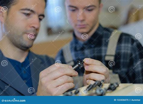 Men screwing a bolt stock image. Image of thread, bolt - 122436075