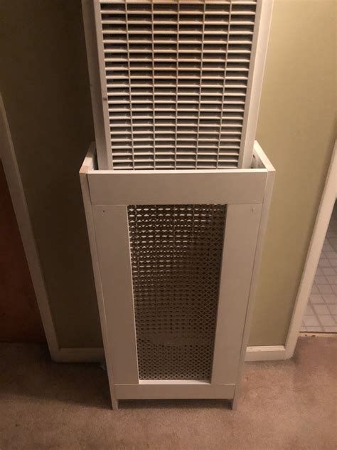 My husband made this cover for our wall furnace to protect our littles ...