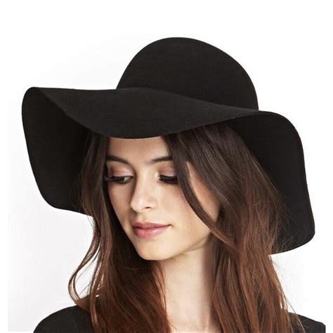 Black floppy wool hat, brand Forever 21. Excellent... - Depop