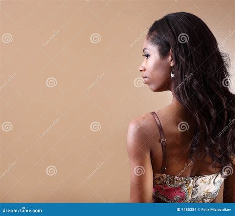 Woman Looking Over Her Shoulder Stock Photo - Image of hair, attractive ...