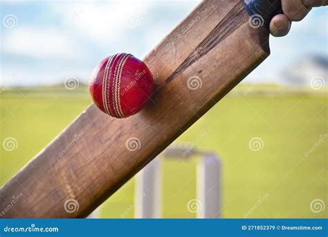 Cricket Player Batsman Hitting Ball with Stumps on Cricket Pitch Stock ...