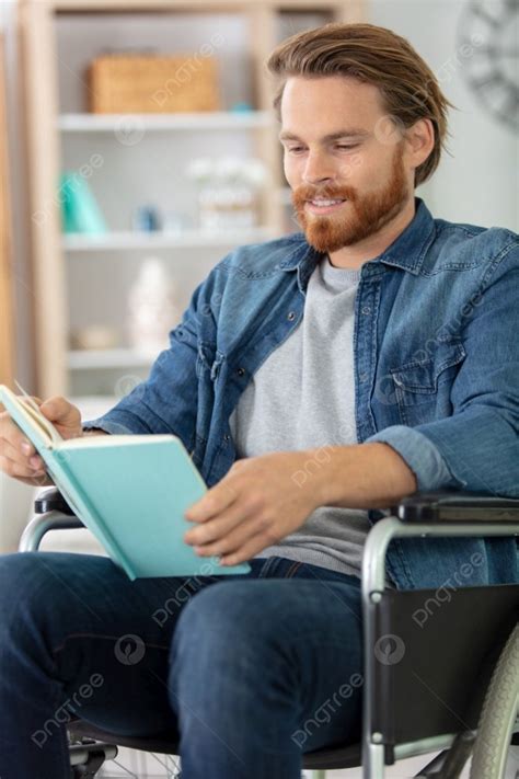 Smart Disabled Guy Reading During Breakfast Photo Background And ...