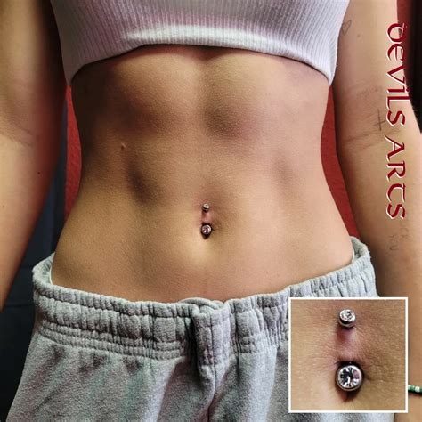 Why Is My Belly Button Piercing Bleeding? - Psycho Tats