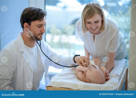 Mom Smiling To a Baby while Pediatrcician Listening To Babys Heart Stock Photo - Image of growth ...