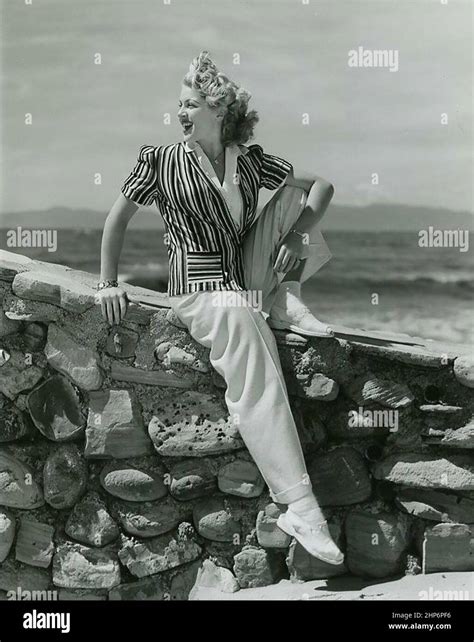 Candid of Lana Turner on the beach ca. 1941 Stock Photo - Alamy