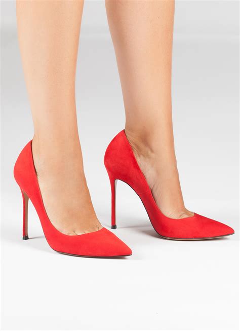 Red suede point-toe stiletto heel pumps . PURA LOPEZ