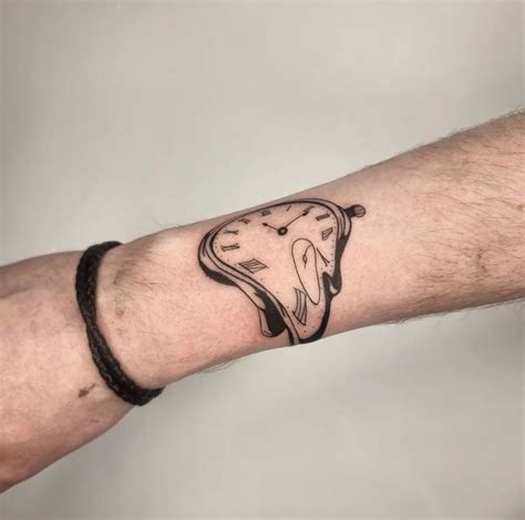 Salvador Dali Melting Clock Tattoo