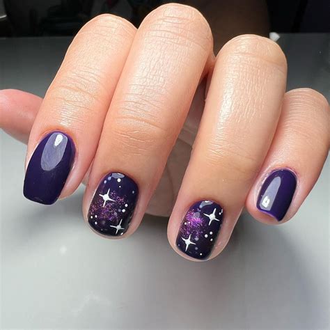 If you've been following nail design trends, you know that galaxy nails ...