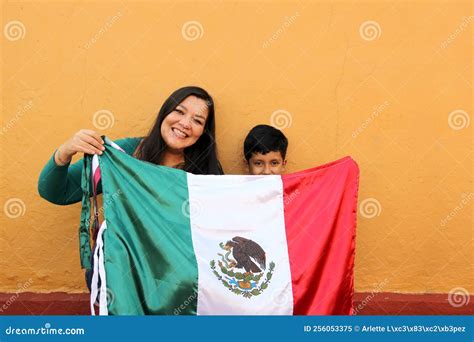 Latin Mexican Mom and Son Show the Flag of Mexico Very Proud of Their ...