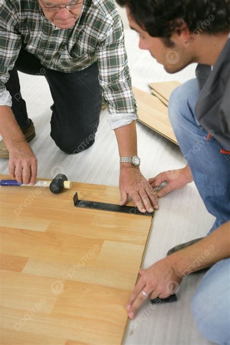 Father And Son Installing Wooden Flooring Photo Background And Picture ...