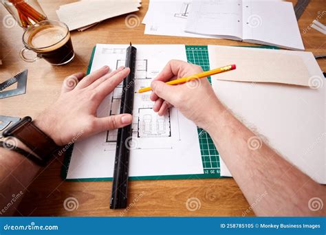 POV Shot of Male Architect Working in Office Measuring Plans for New Building Stock Image ...