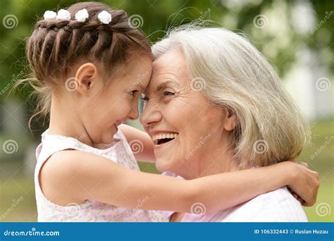 Granny And Granddaughter Posing Outdoors Royalty-Free Stock Photography ...
