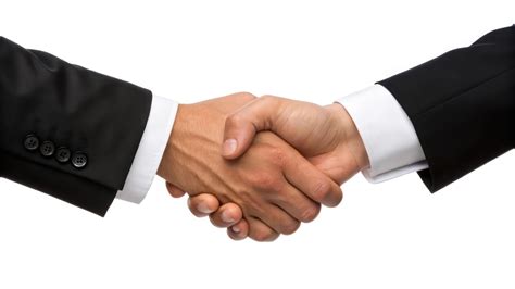 Two business people shaking hands over a white background 57022300 ...