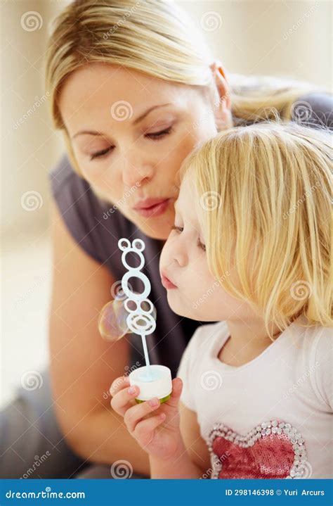Blowing, Bubbles and Games with Mom and Child Together in Home Playing ...