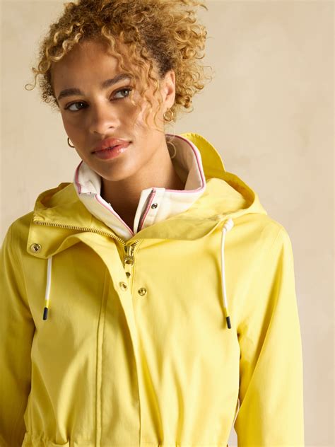Buy Joules Portwell Yellow Waterproof Raincoat With Hood from the Next ...