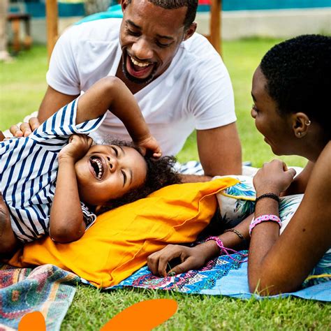 Download A beautiful black family enjoying bonding time together ...