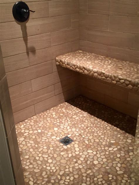 Glazed Java Tan Pebble Tile | Pebble shower floor, Shower tile, Shower ...