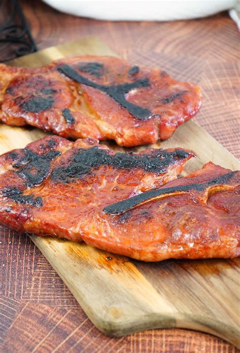 Smoked Pork Steaks with Beer Braised Onions • Smoked Meat Sunday