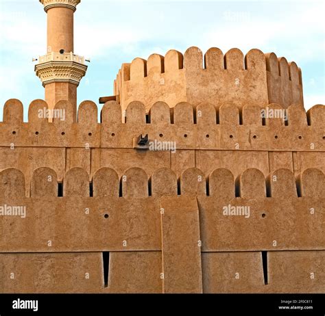 In oman muscat the old mosque minaret and religion in clear sky Stock Photo - Alamy