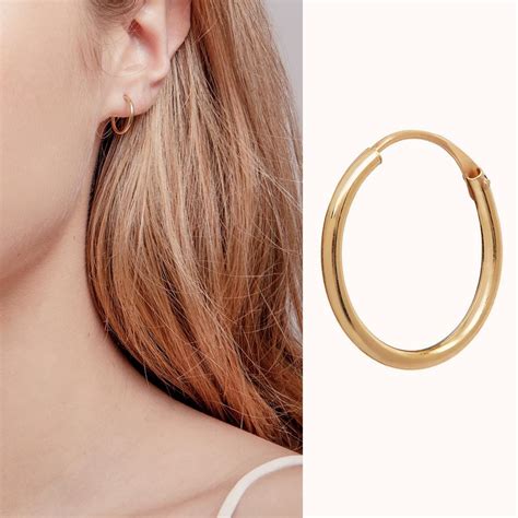Solid Gold Tiny Hoop Earrings at Stella Prell blog