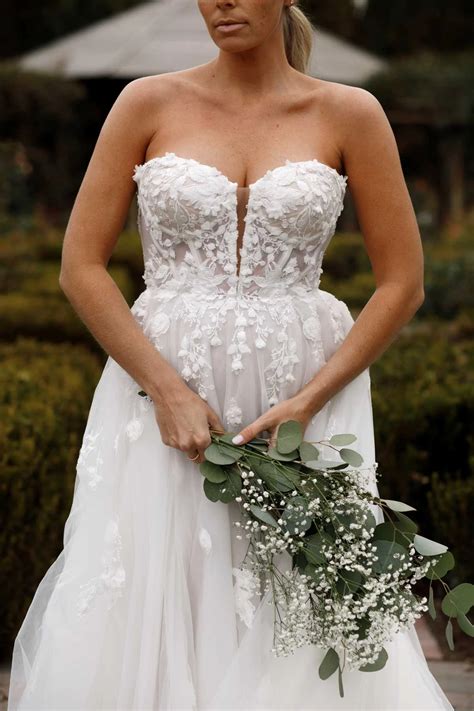 Romantic Off-the-Shoulder Long Sleeve Wedding Dress with Plunging Neckline