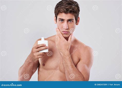 Metro Sexual Manliness. Studio Shot of a Handsome Bare Chested Young Man Grooming. Stock Image ...