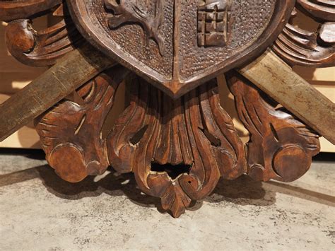 Early 1900s Carved Wooden Coat of Arms Plaque with Crossed Swords at ...