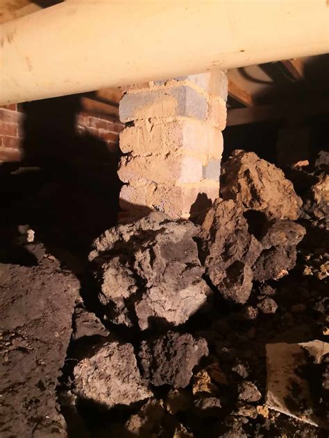 Best safest way to clear dirt from under house that is pushing against ...