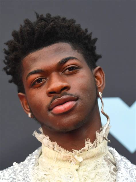 Download Close-up Photo Of Black Gay Man Lil Nas X Wallpaper | Wallpapers.com