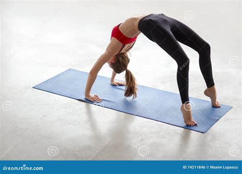 Beautiful Young Woman Doing Yoga Exercise Bridge Pose Stock Photo - Image of pilates, fitness ...