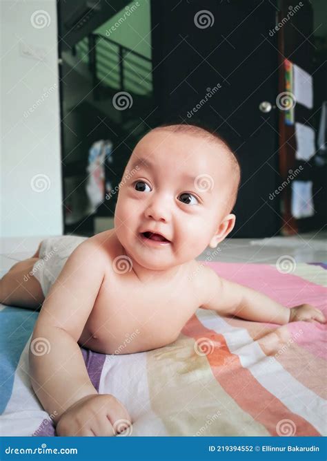 Portrait of a Happy Baby, Smiling and Giggling Stock Photo - Image of ...