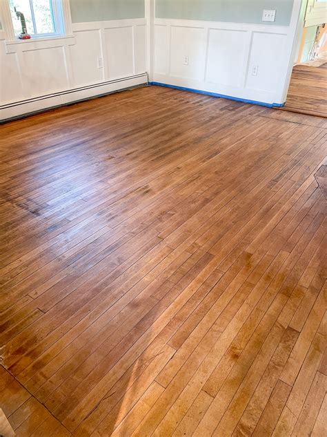 STAINING OUR FLOORS WITH DARK TUNG OIL | Everyday Laura