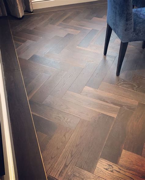 Beautiful dark, rich in tone, engineered herringbone floors with ...