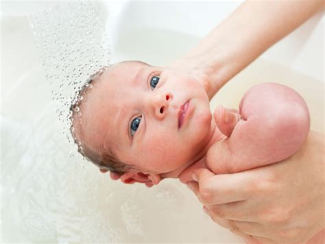 When should i give baby first bath online