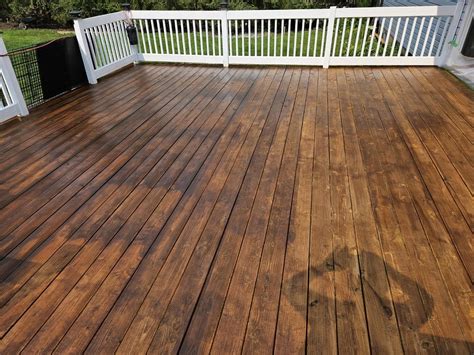 How Long before You Can Stain Pressure Treated Wood: Expert Tips