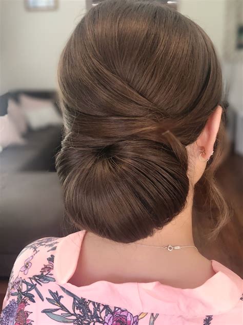 Low chignon bun hairstyle for brides Hair by Bridgette at Powder Room ...