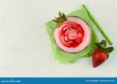 Strawberry Milk Smoothie with Syrup in a Glass Top View. Copy Space ...
