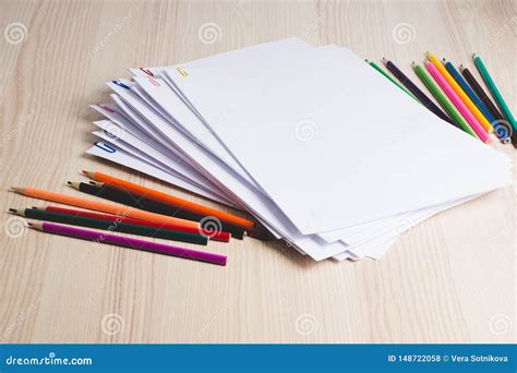 Stack of White Papers and Pencils with Paper Clips on Office Table Stock Photo - Image of folder ...