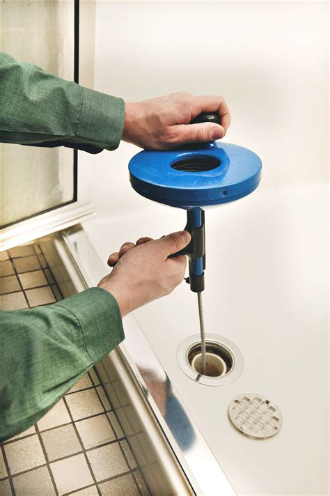 How to Use a Drain Snake to Clear Clogged Sinks and Showers