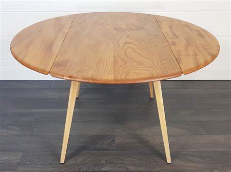 Round Drop Leaf Dining Table With Extra Leaves at Dominic Nanya blog