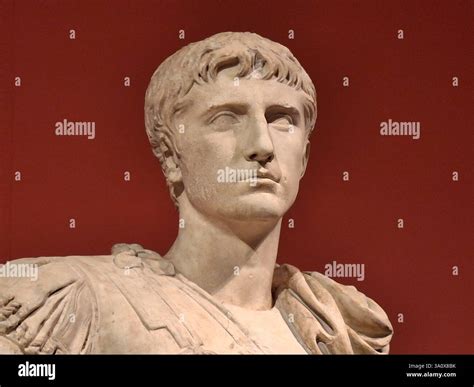 Close up portrait of a marble bust or statue of ancient Roman emperor ...
