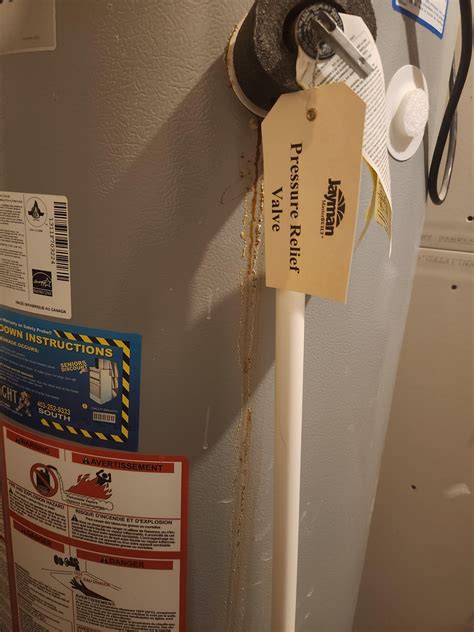 Hot Water Tank Leaking From Top Thermostat at Carly Decosta blog