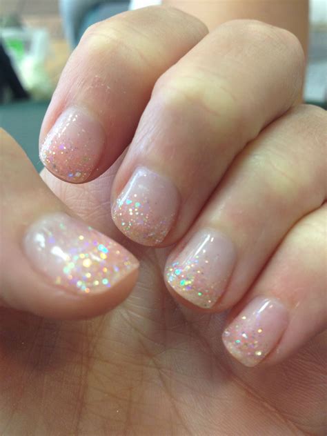 Clear Gel manicure with pink glitter. Nice clean look for all seasons ...