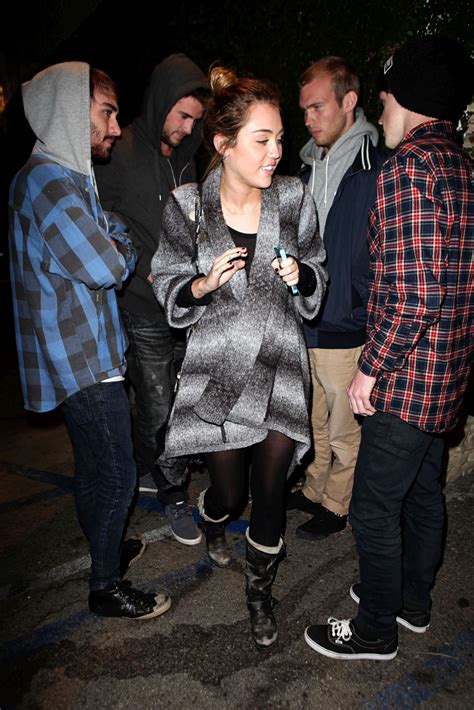 Celebrity Leaked Nude: Miley Cyrus Braless See-Through Black Top Candids