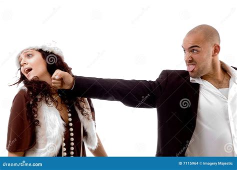 Young Man Punching His Partner Stock Photo - Image of holidays, female ...