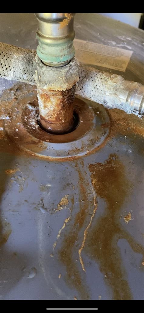 Hot Water Tank Leaking From Top Thermostat at Carly Decosta blog